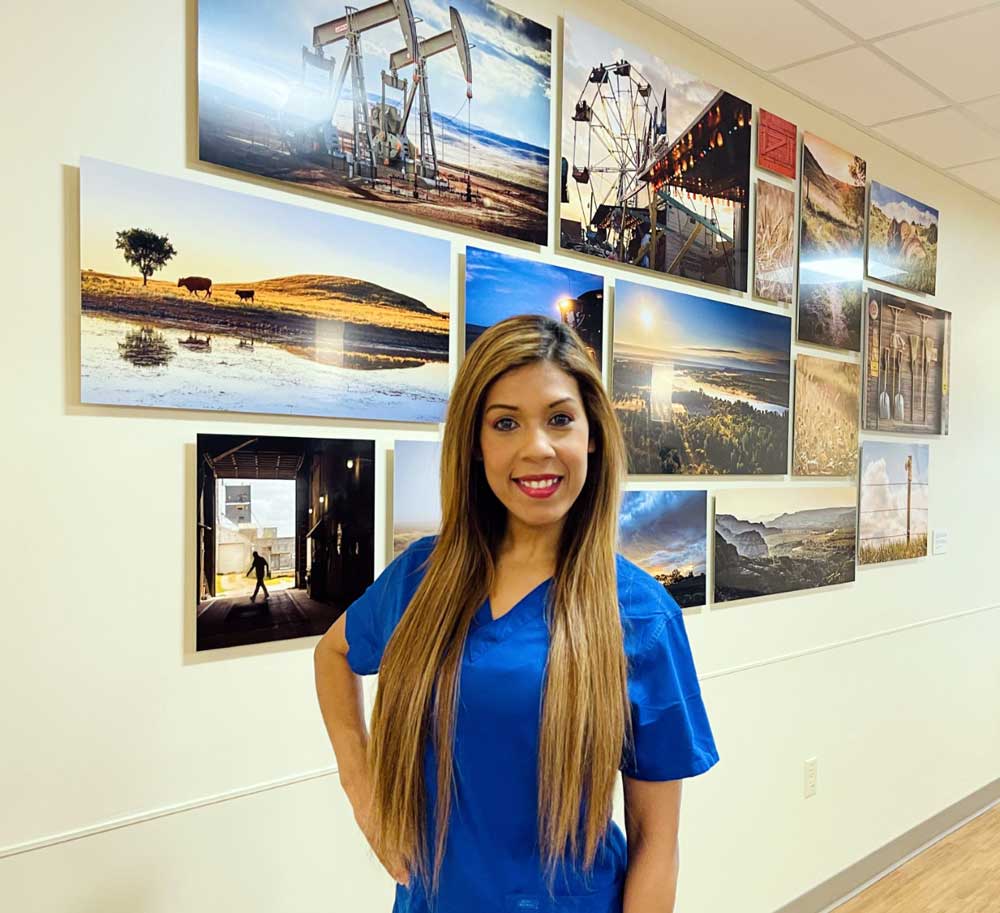 Dr. Jessica Mastrapa in the hall of McKenzie Health in Watford City, ND