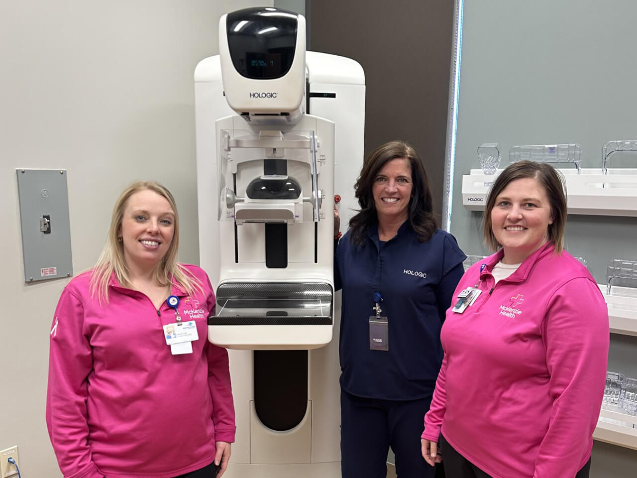 Two McKenzie Health Radiology Department team members standing next to a radiology expert and a in Watford City